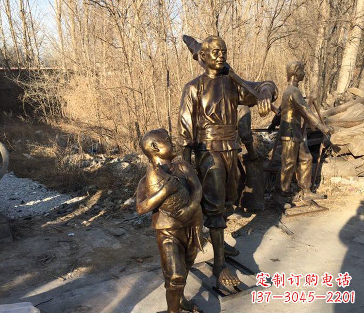 烟台抱着鱼的儿童街边小品铜雕
