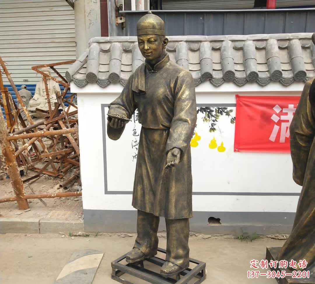 烟台步行街店小二人物铜雕
