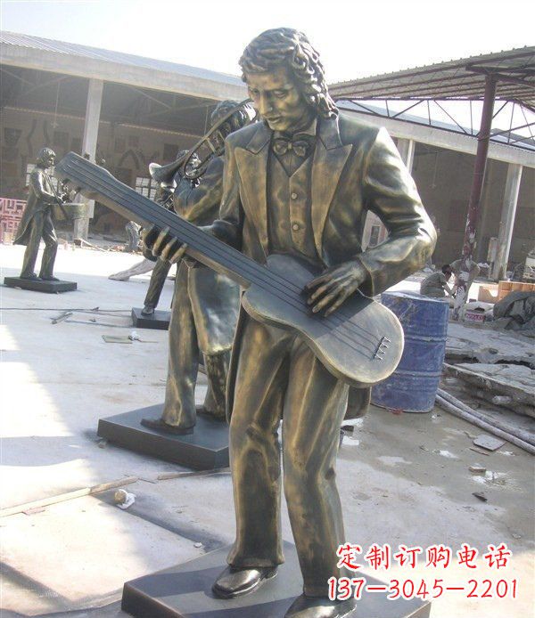 烟台西方人物铜吉他雕塑
