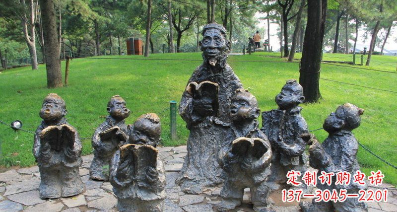 烟台公园读书的儿童人物铜雕