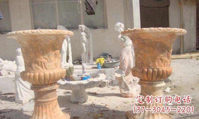 烟台公园景观晚霞红花盆石雕