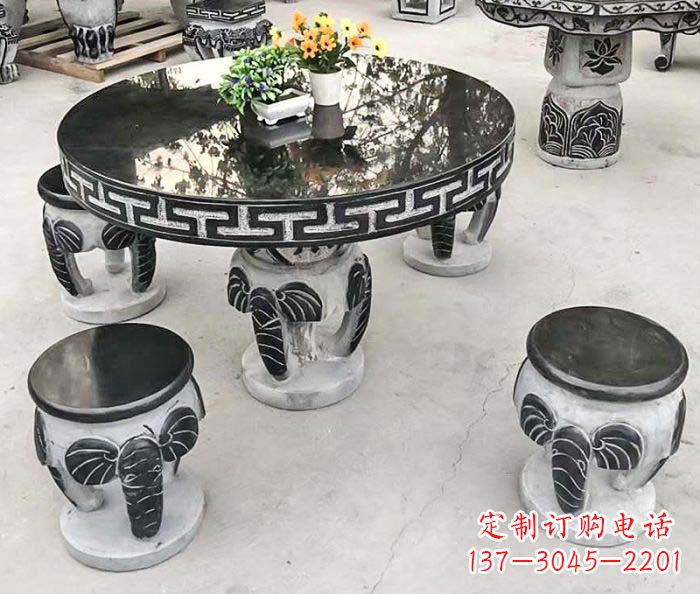 烟台圆形桌凳石雕-为公园景观增添艺术气息