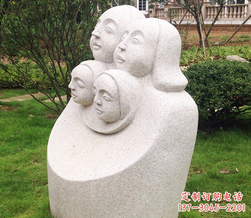 烟台公园母子人头像石雕