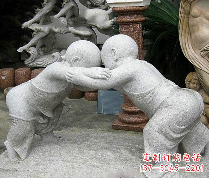烟台可爱小孩摔跤石雕