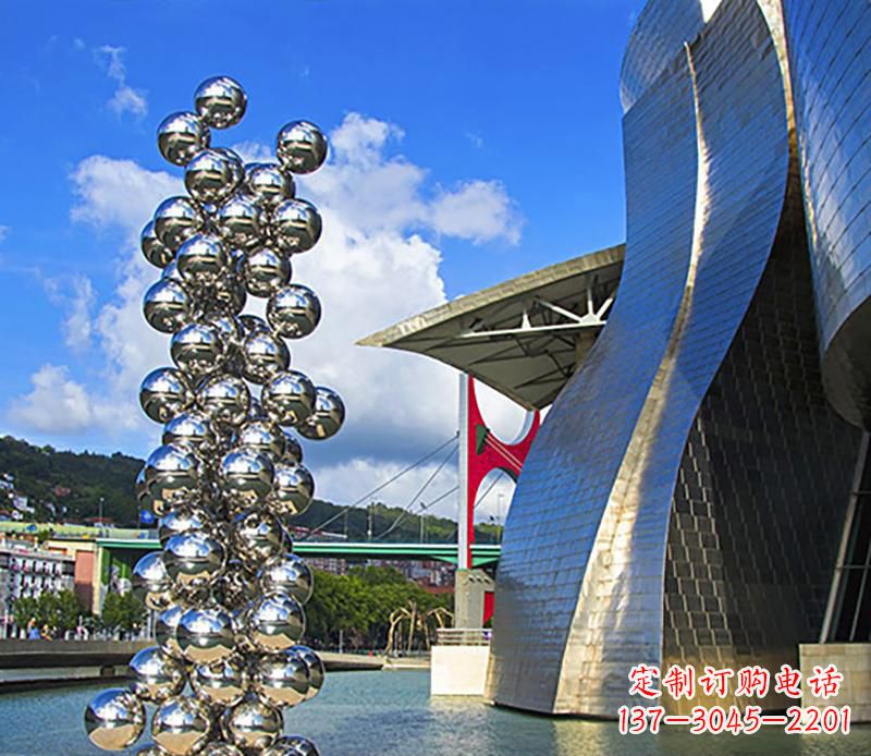 烟台高端不锈钢抽象龙柱雕塑