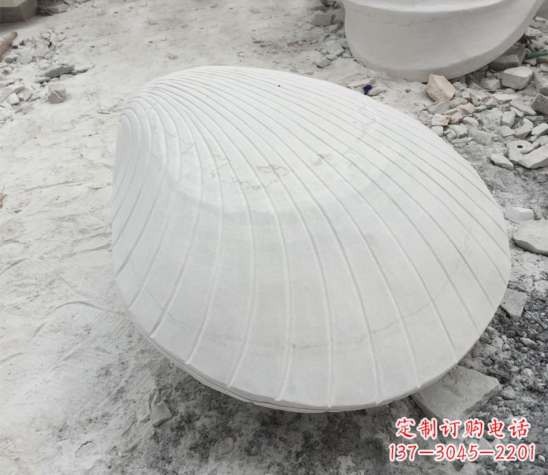 烟台用贝壳雕刻出美丽的汉白玉雕塑