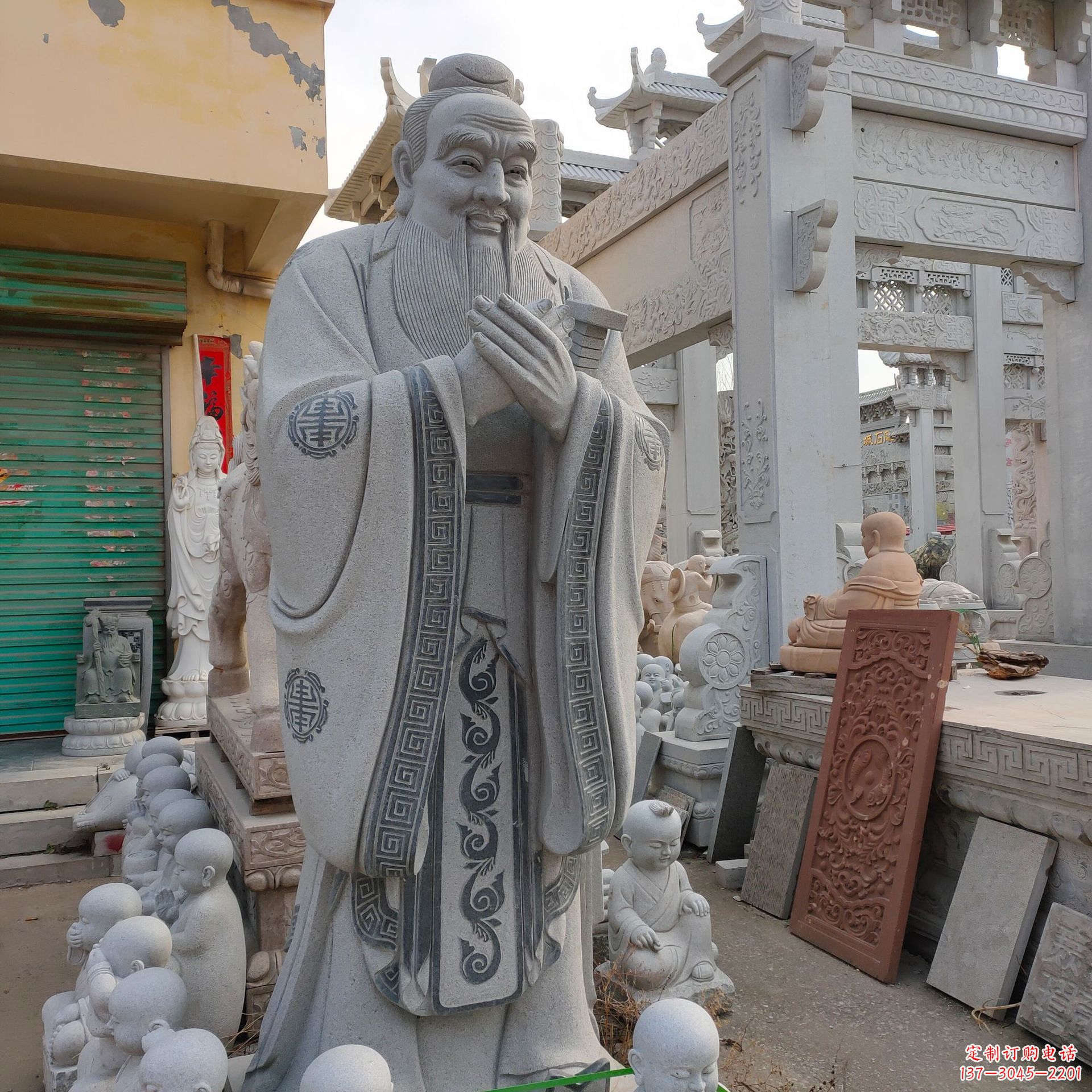 烟台孔子问礼石雕塑像
