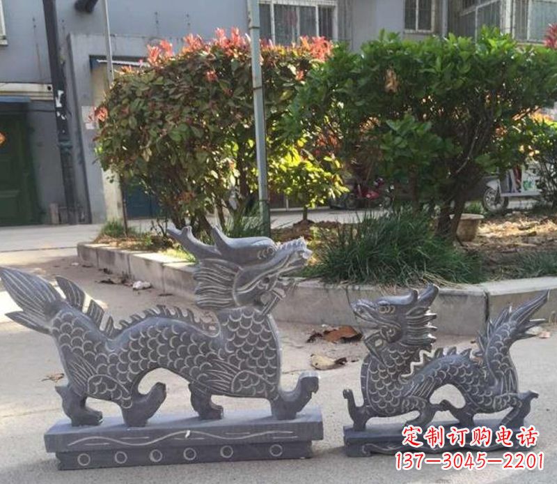 烟台青石雕刻母子龙是由中领雕塑工厂家生产的一…