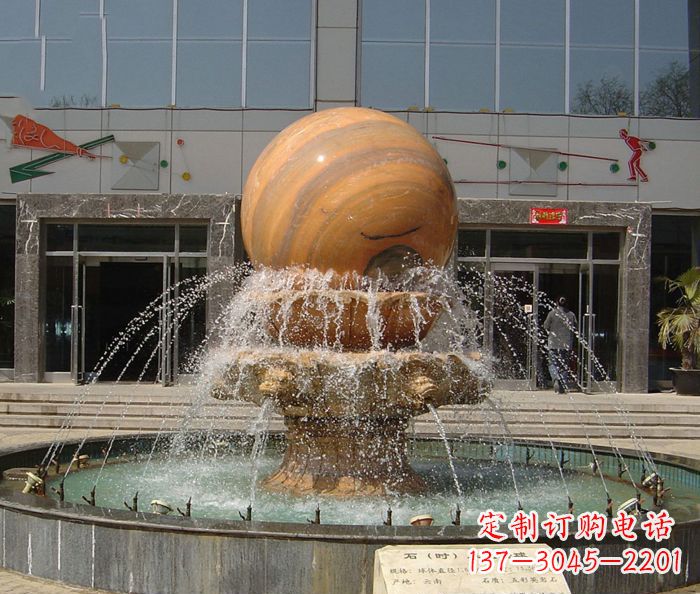 烟台石来运转球晚霞红风水球石雕
