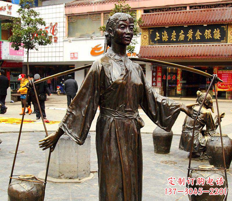 烟台挑着罐子的古代女人铜雕