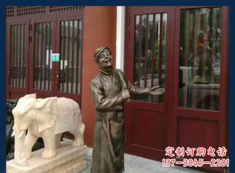 烟台铜雕店小二酒店迎宾人物雕塑