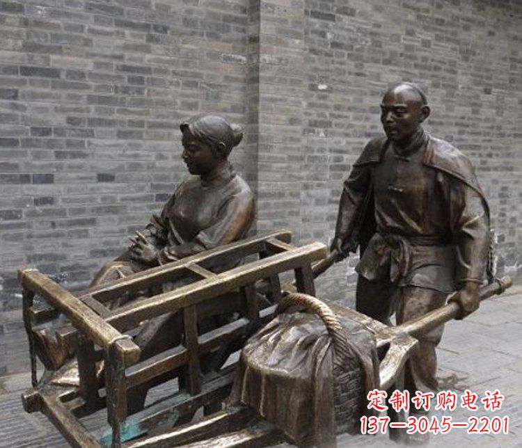 烟台推独轮车的人物铜雕