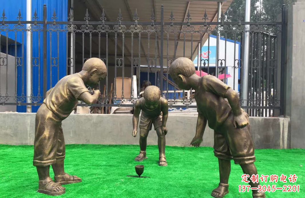 烟台玩陀螺儿童铜雕塑