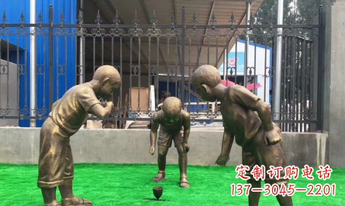 烟台玩陀螺儿童铜雕