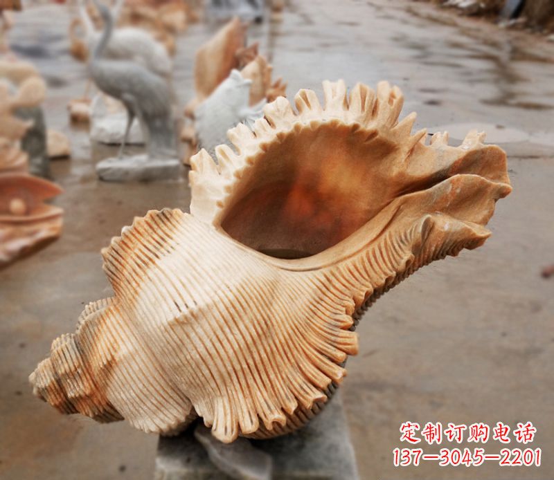 烟台晚霞红海螺石雕广场景观雕塑
