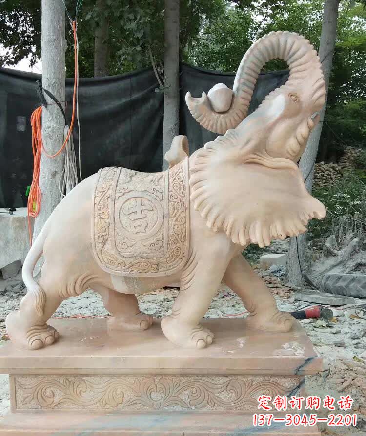 烟台晚霞红卷元宝大象雕塑