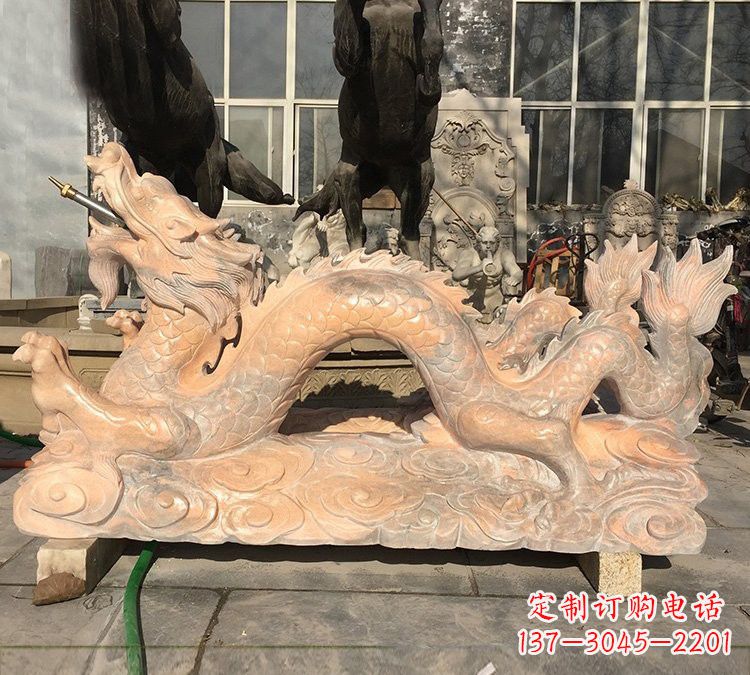 烟台晚霞红石雕喷水龙