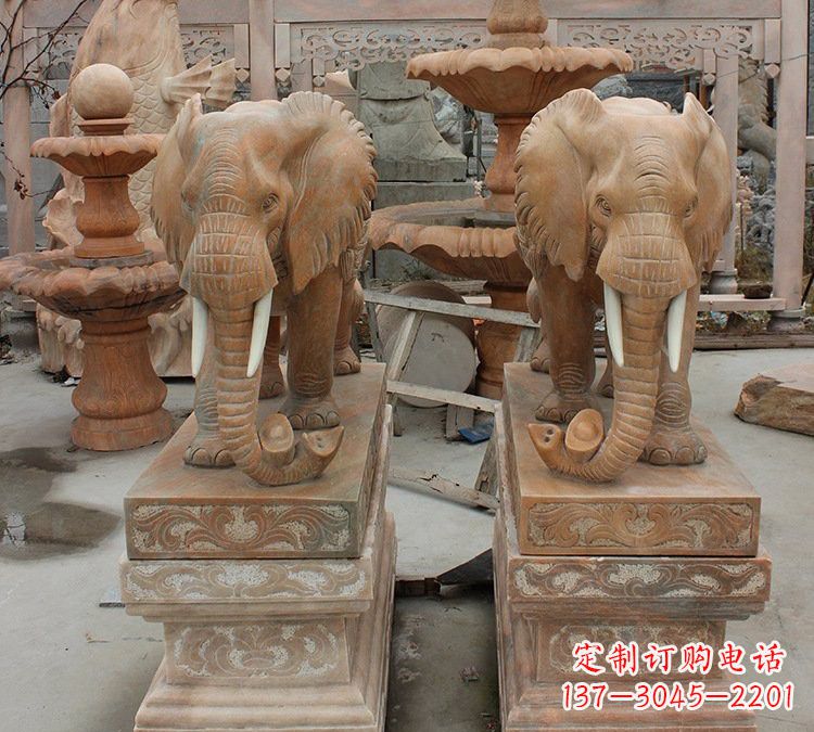 烟台晚霞红石雕元宝大象