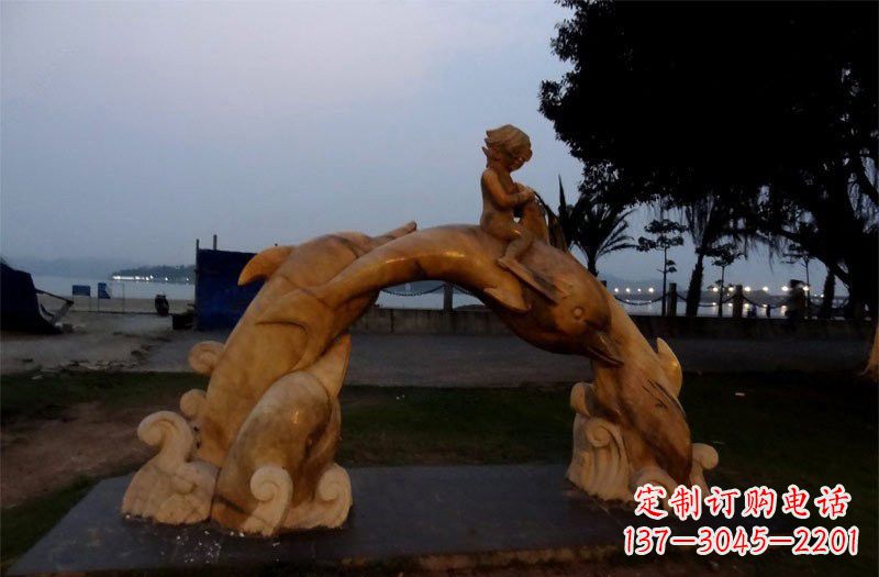 烟台西方儿童骑海豚石雕