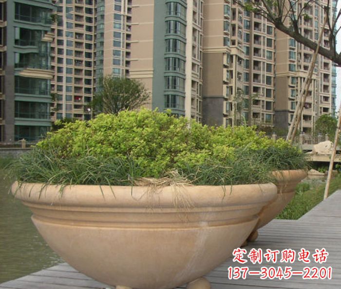 烟台小区景观晚霞红花盆石雕