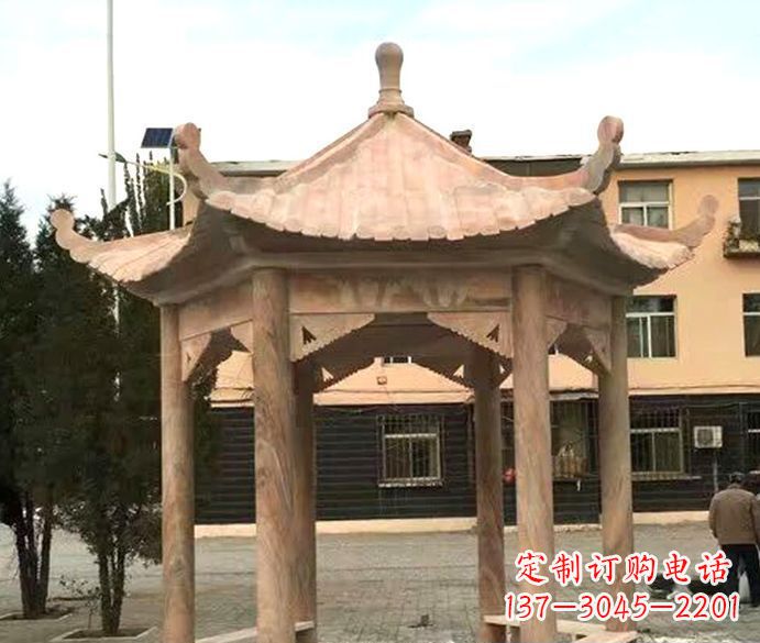 烟台园林晚霞红六角石雕凉亭